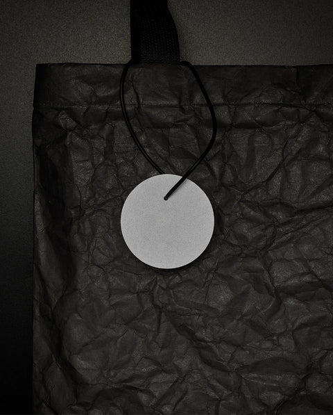 Swinging reflector - round