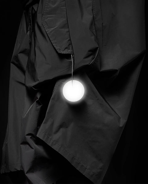 Swinging reflector - round