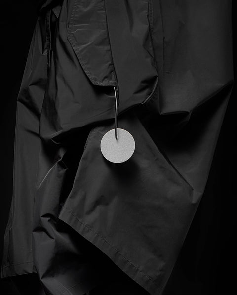 Swinging reflector - round